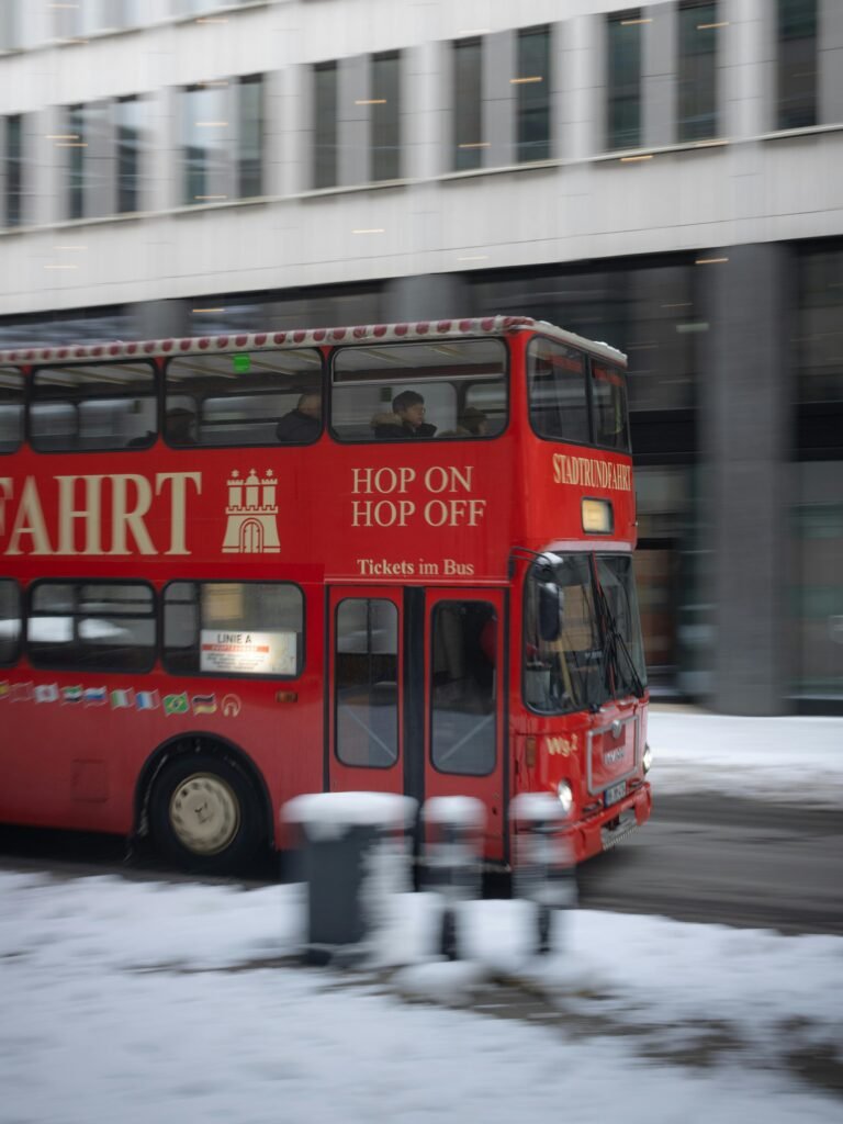 Hop-on hop-off Washington DC sightseeing bus with tourists exploring monuments