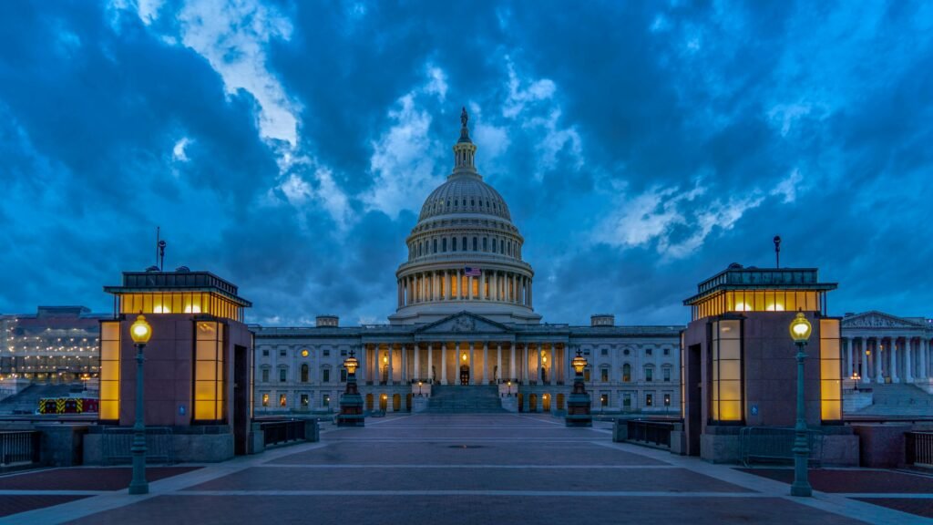 The United States Capitol building at sunrise on Capitol Hill in Washington, DC.