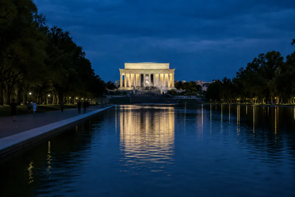 Illuminated Lincoln Memorial reflected in the Reflecting Pool at blue hour